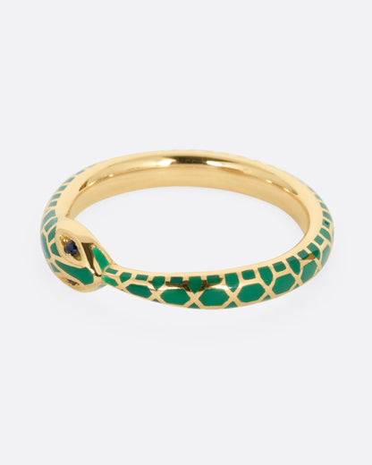Yellow gold green enamel snake ring, side view of the snake's head and green scales