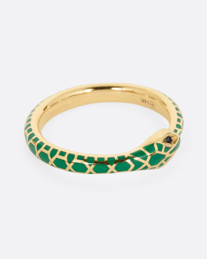 Yellow gold green enamel snake ring, side view with the head facing right