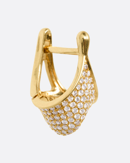 Yellow gold pave diamond huggie earrings, side view of one hoop showing the hinged back