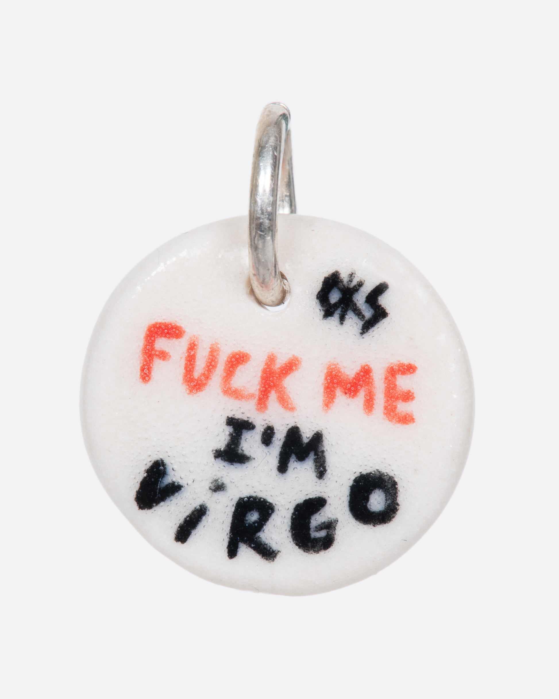 A handmade and painted porcelain zodiac disc charm with a sterling silver bail, featuring a sex position specific to each zodiac.