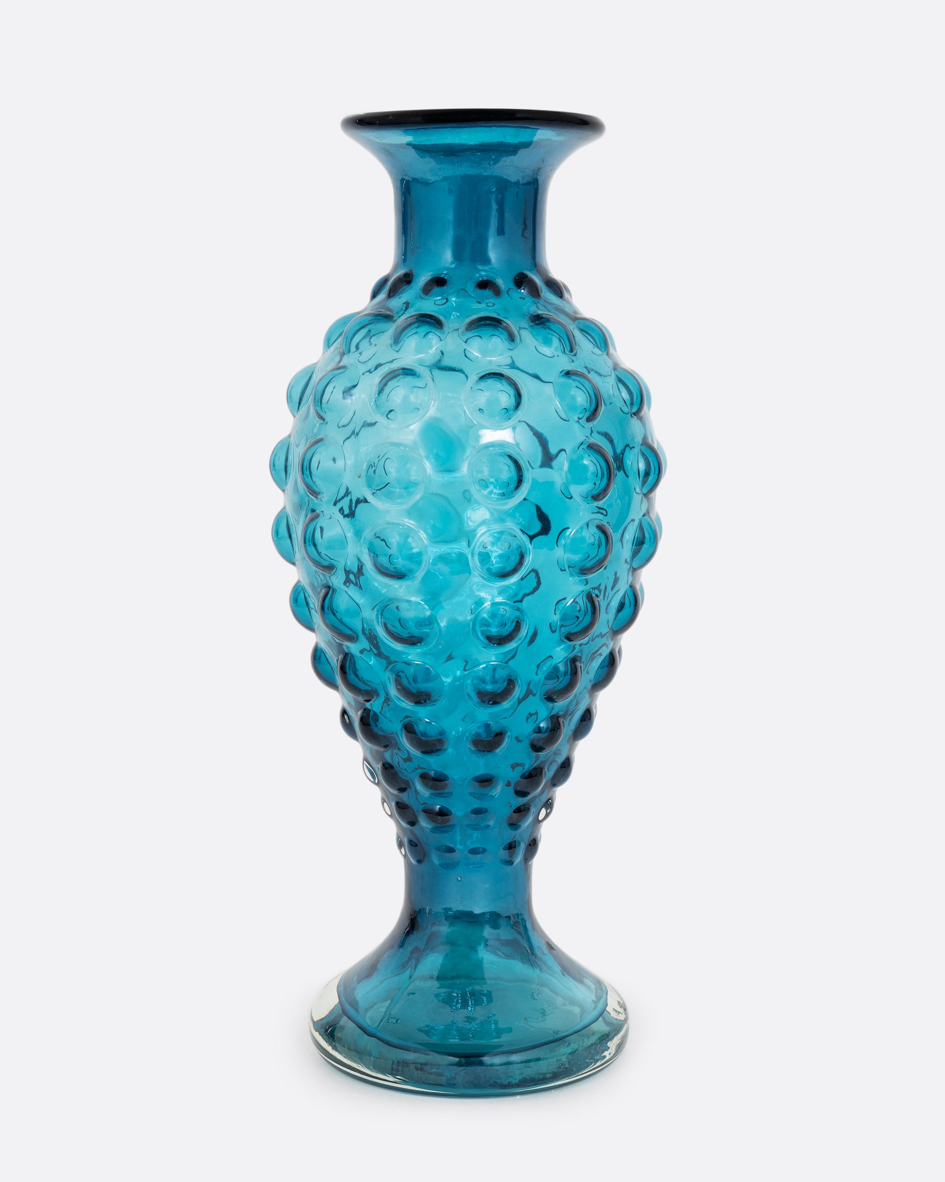 A teal hourglass glass vase with a bubbled texture. Shown from the front.