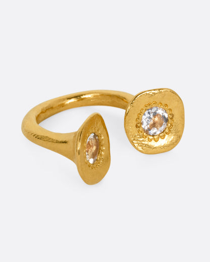 Yellow gold aquamarine open ring, side view showing the aquamarines framed by granulated gold