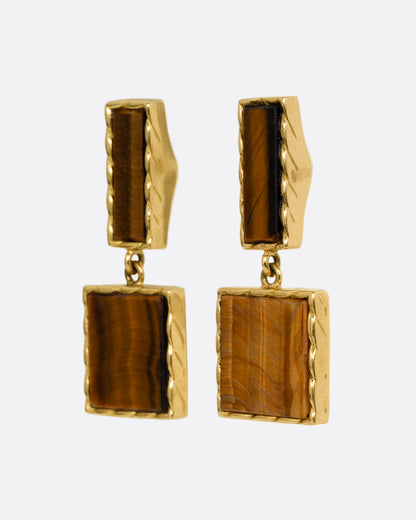 Vintage yellow gold tiger's eye drop earrings, angled view of the rope-edged frames