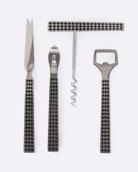 A four piece stainless steel bar set with a checked pattern. The pieces are shown lined up lying flat.