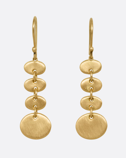 A yellow gold pair of earrings with linked graduated ovals. Shown from the front.