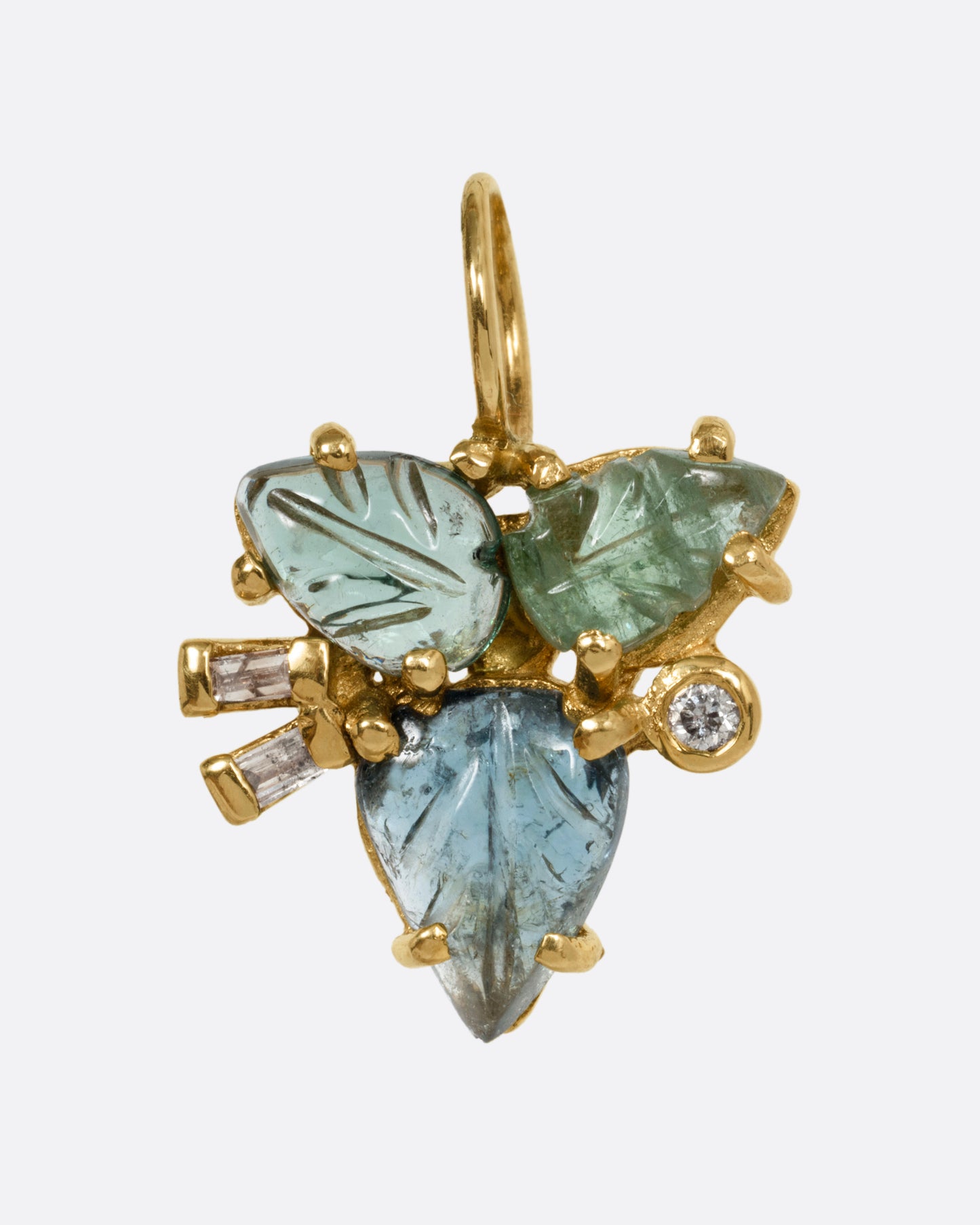 A yellow gold pendant with tourmalines and diamonds, in a botanical shape, shown from the front.