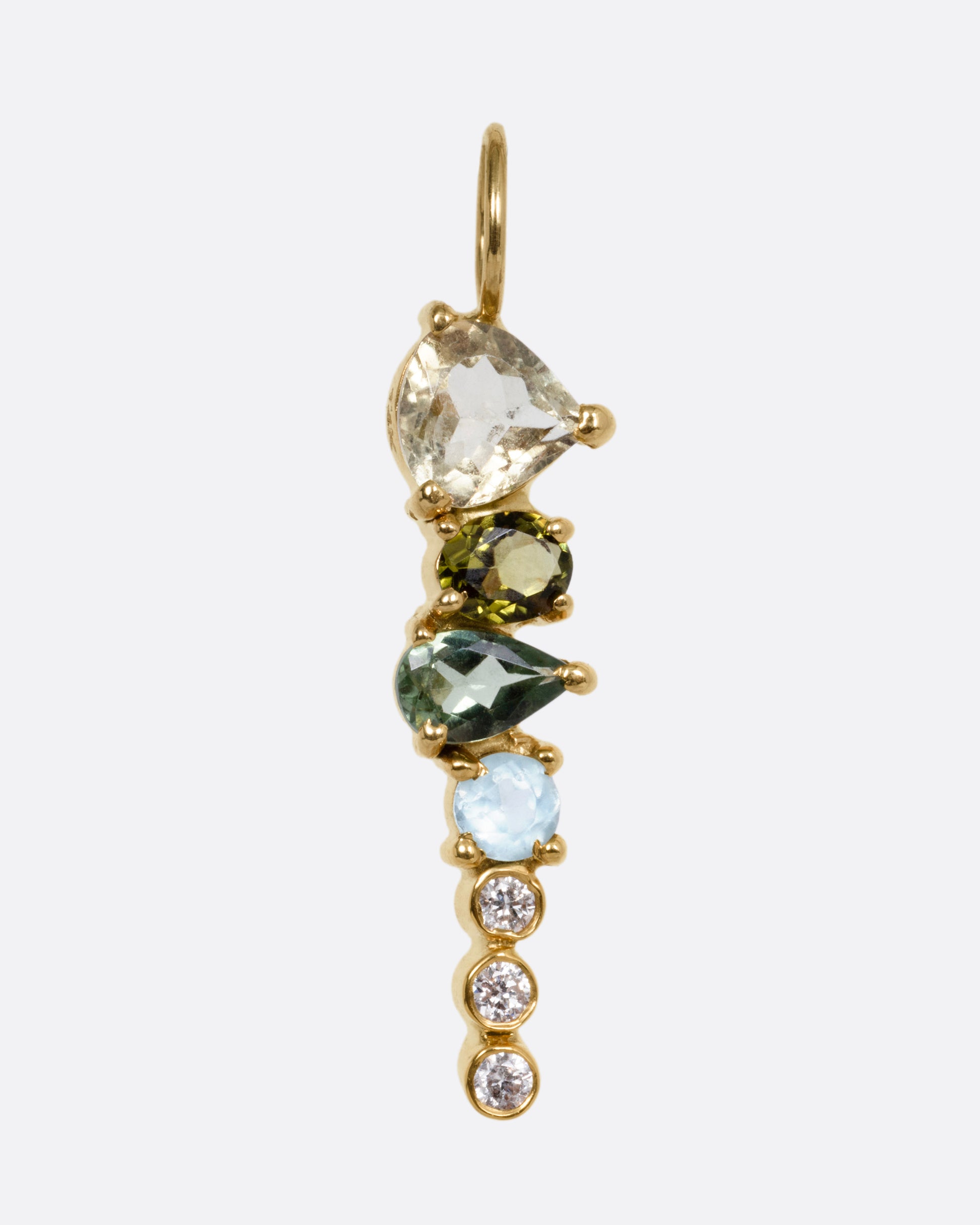 A yellow gold pendant with stacked tourmalines, apatites, sapphires, and diamonds, shown from the front.