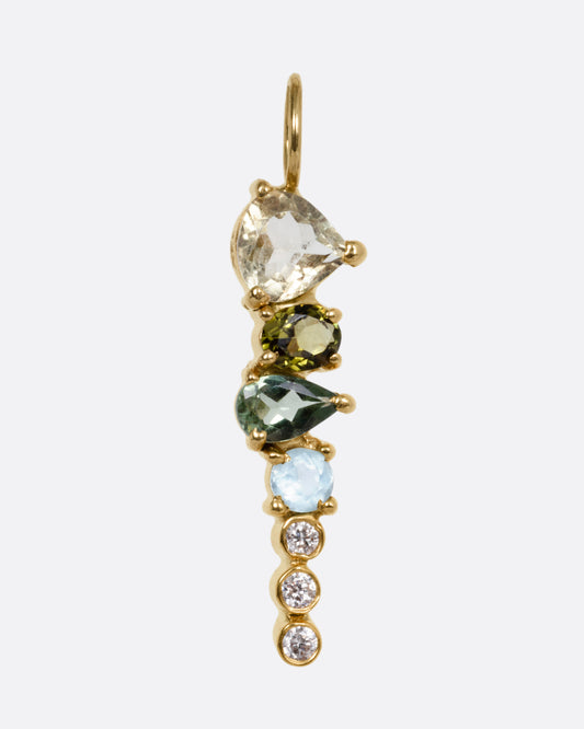 A yellow gold pendant with stacked tourmalines, apatites, sapphires, and diamonds, shown from the front.