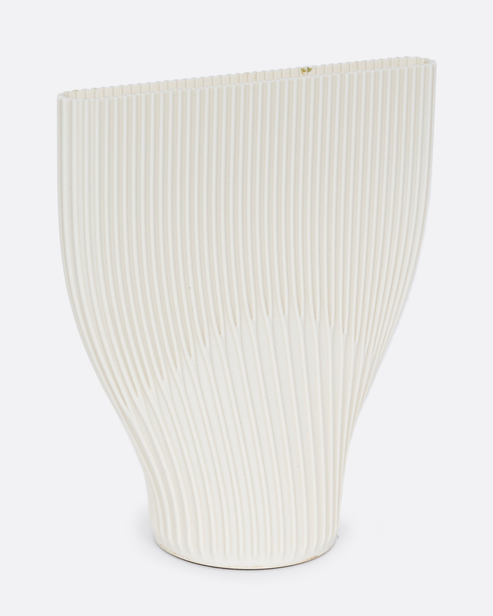  A ribbed cream 3D printed vase with a wide top and narrow base. Shown from the side.