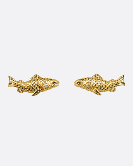 A pair of yellow gold fish earrings. Shown from the front.