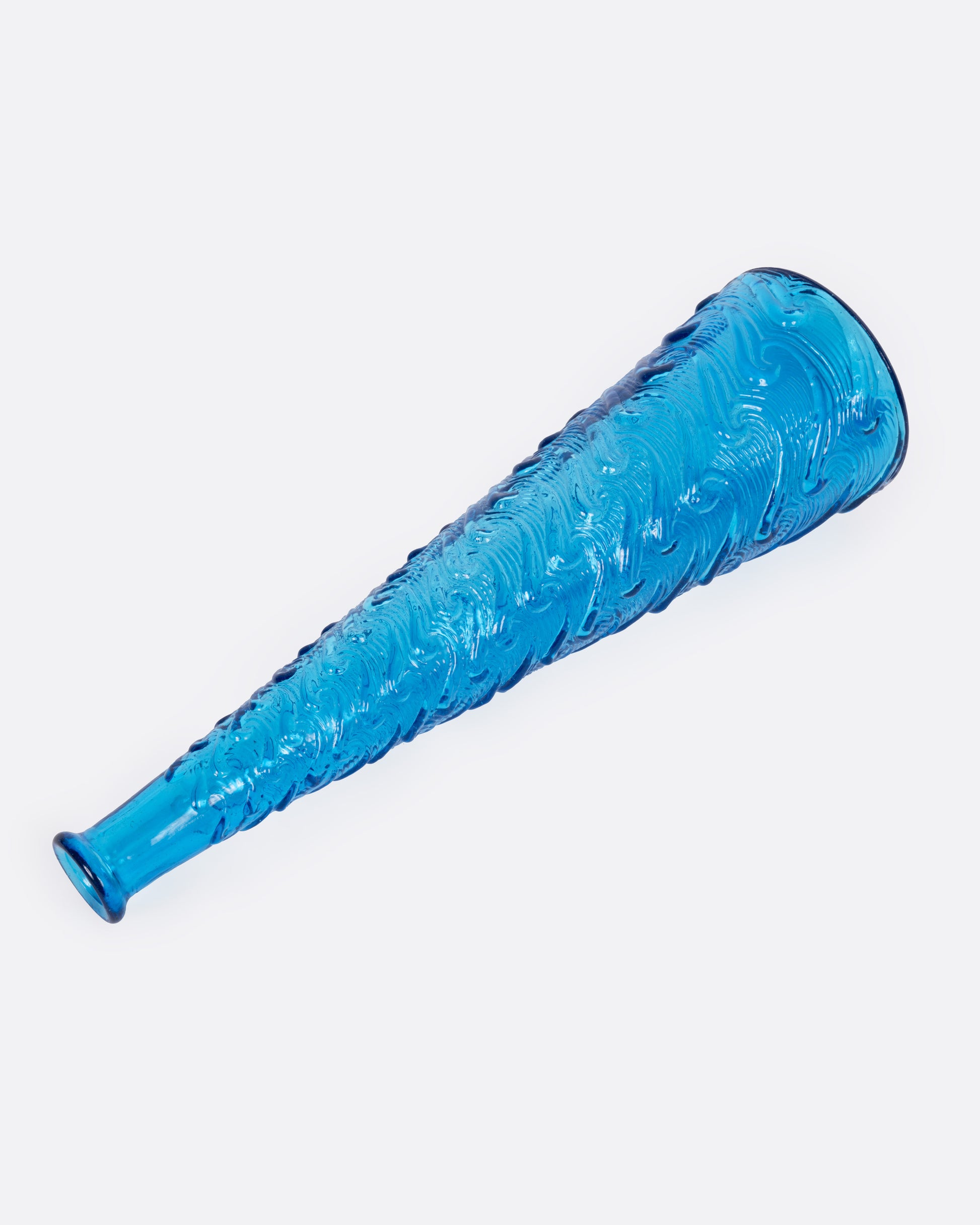 A tall tapered cerulean glass vase with a wavy textured exterior, shown from the side.