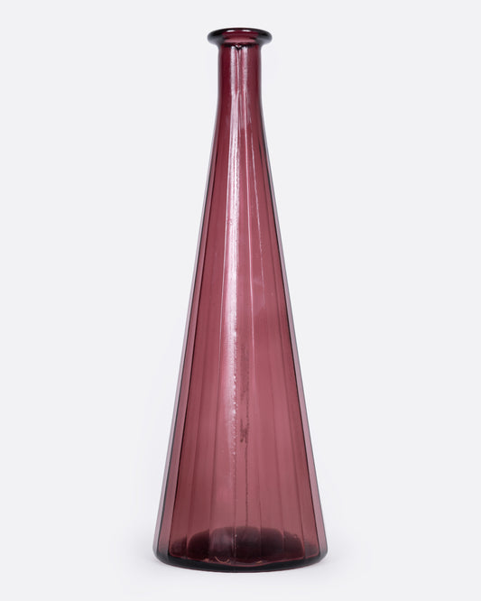 A tall tapered purple glass vase, shown from the front.