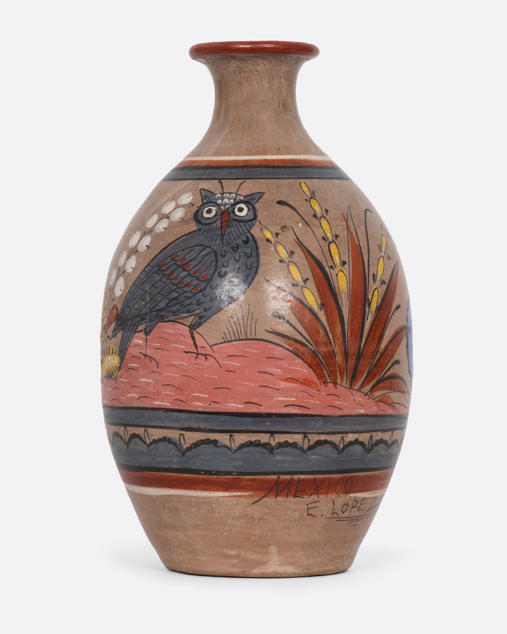 Mexican cceramic tonala vase with painted flowers and owl. View of the owl.