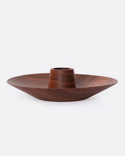 Mahogany wood taper candle holder, side view without a candle