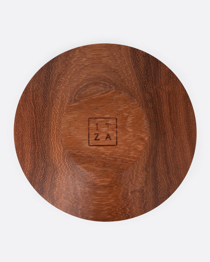 Mahogany wood taper candle holder, underside showing the maker's mark
