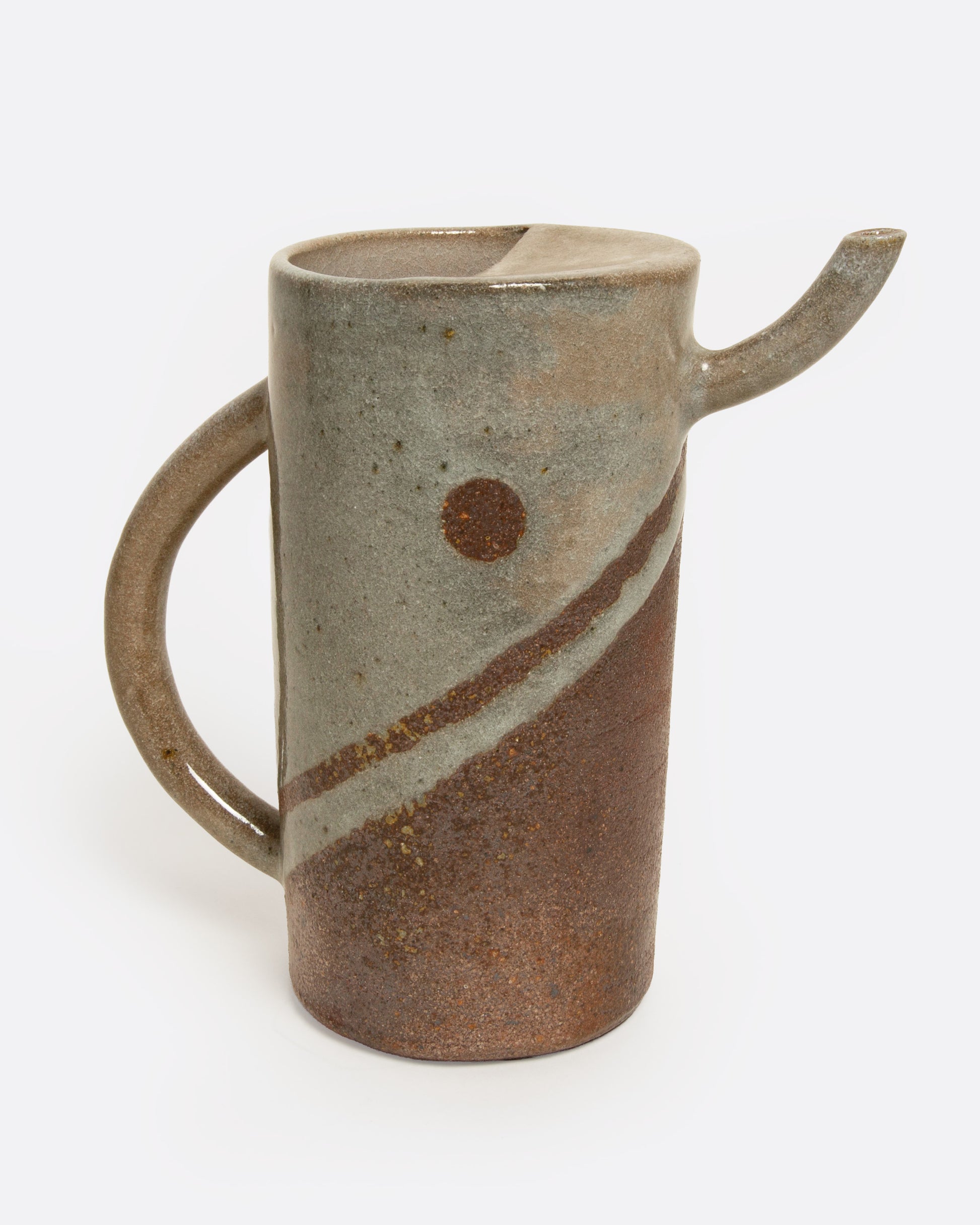 A brown striped ceramic pitcher, shown from the side.