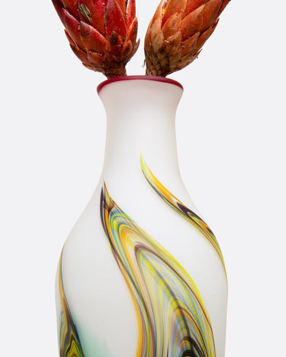 Vintage white and green swirl glass vase, close view with dried flowers