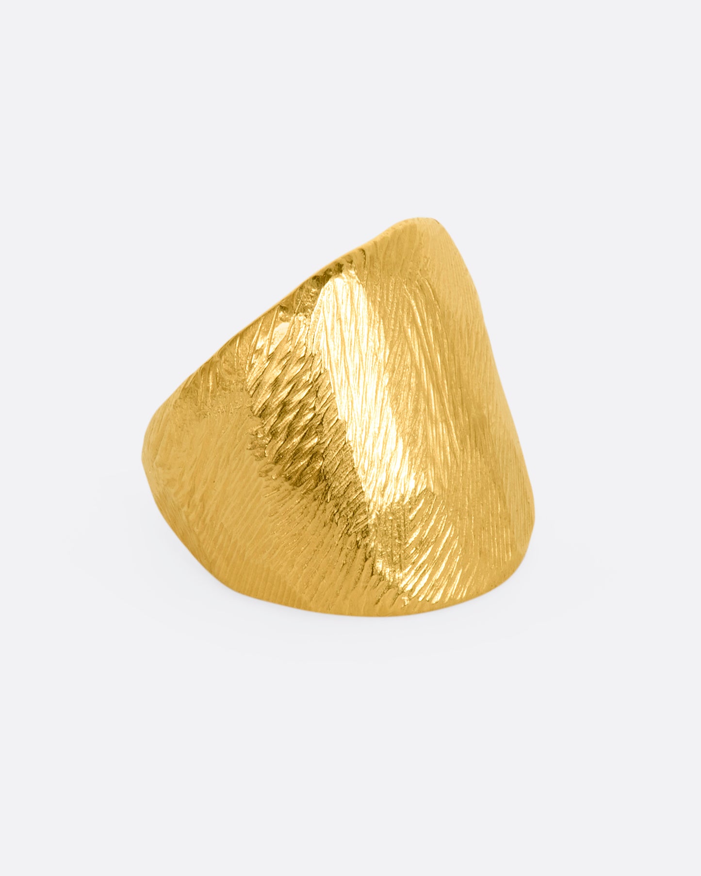 Textured yellow gold wide band ring. View from the alternate side.