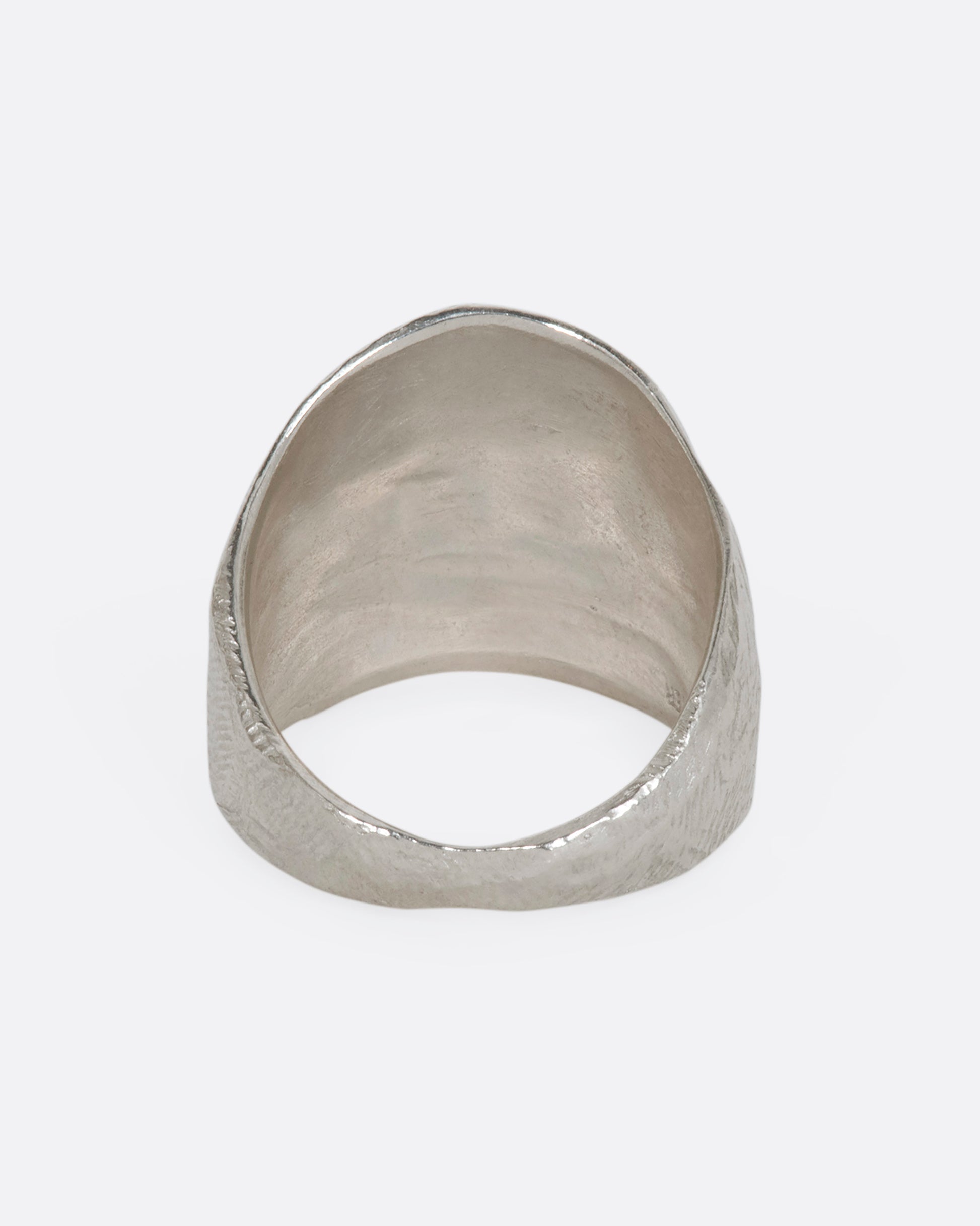 Textured sterling silver wide band ring. View from the back.