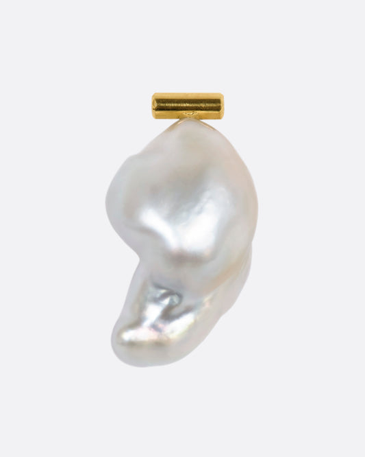 A large baroque pearl stud earring with a yellow gold bar containing diamonds on either end. View from the front.