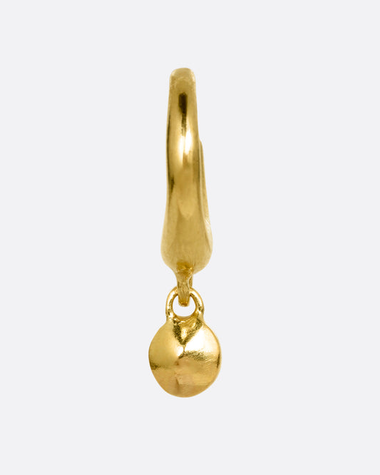 A yellow gold huggie hoop earring with a gold bead dangle. Shown from the front.