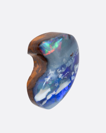 A heart-shaped boulder Australian opal stud earring, shown from the side.