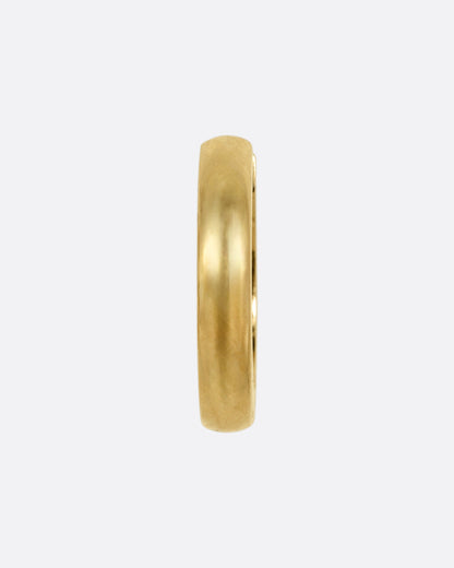 Selin Kent 11.5mm hinged huggie hoop earring in yellow gold, a smooth thick polished hoop