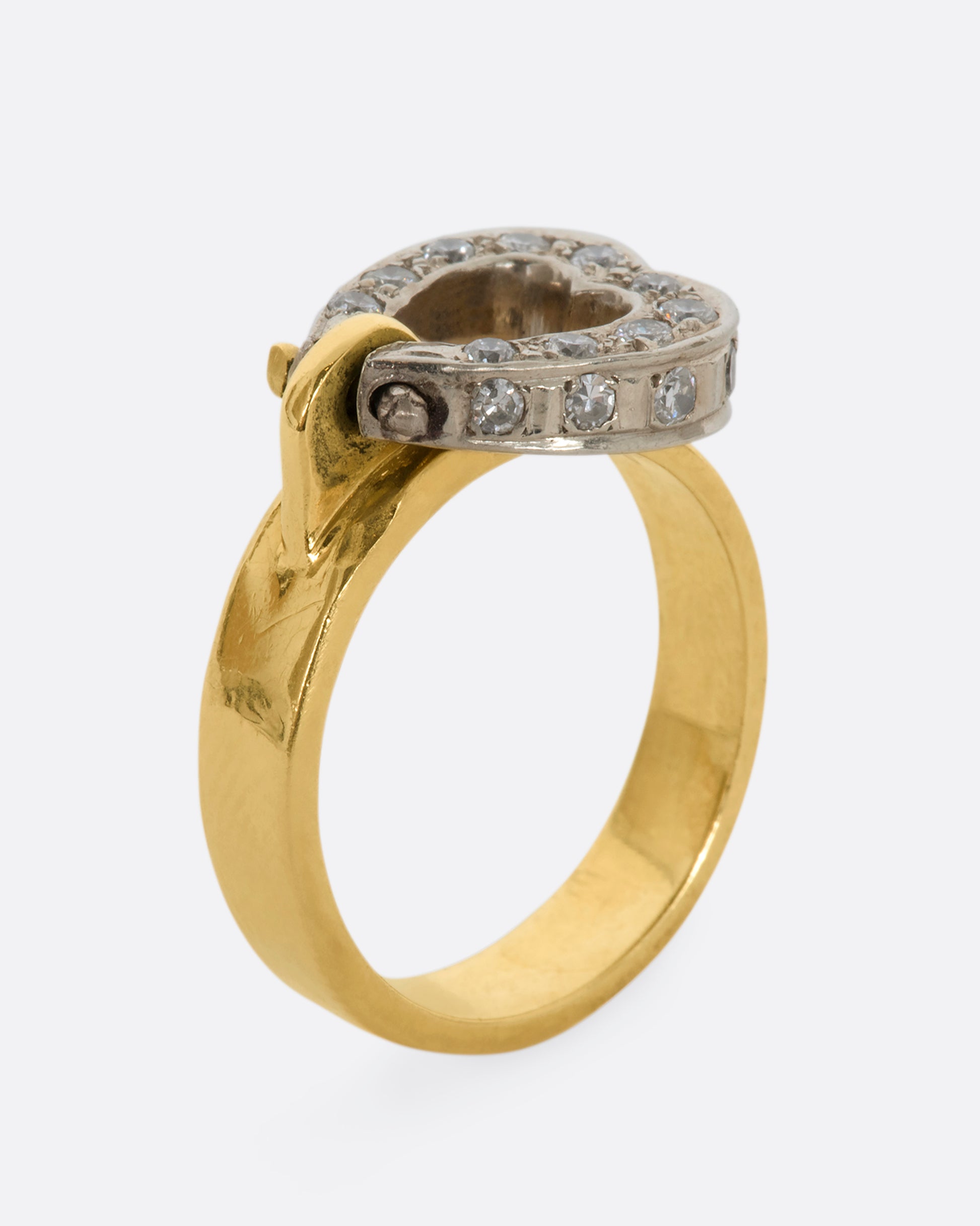 Yellow gold diamond hinged heart ring. View standing up.