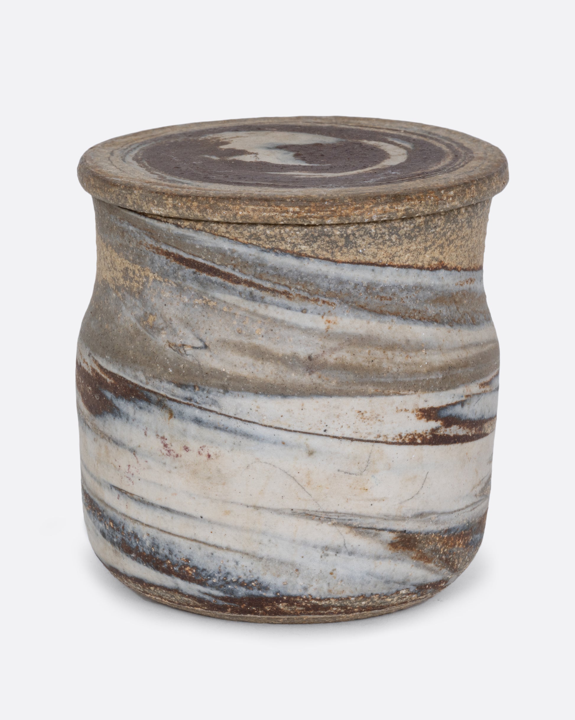 A lidded jar with a gray swirled matte exterior and glazed interior. Shown from the front.