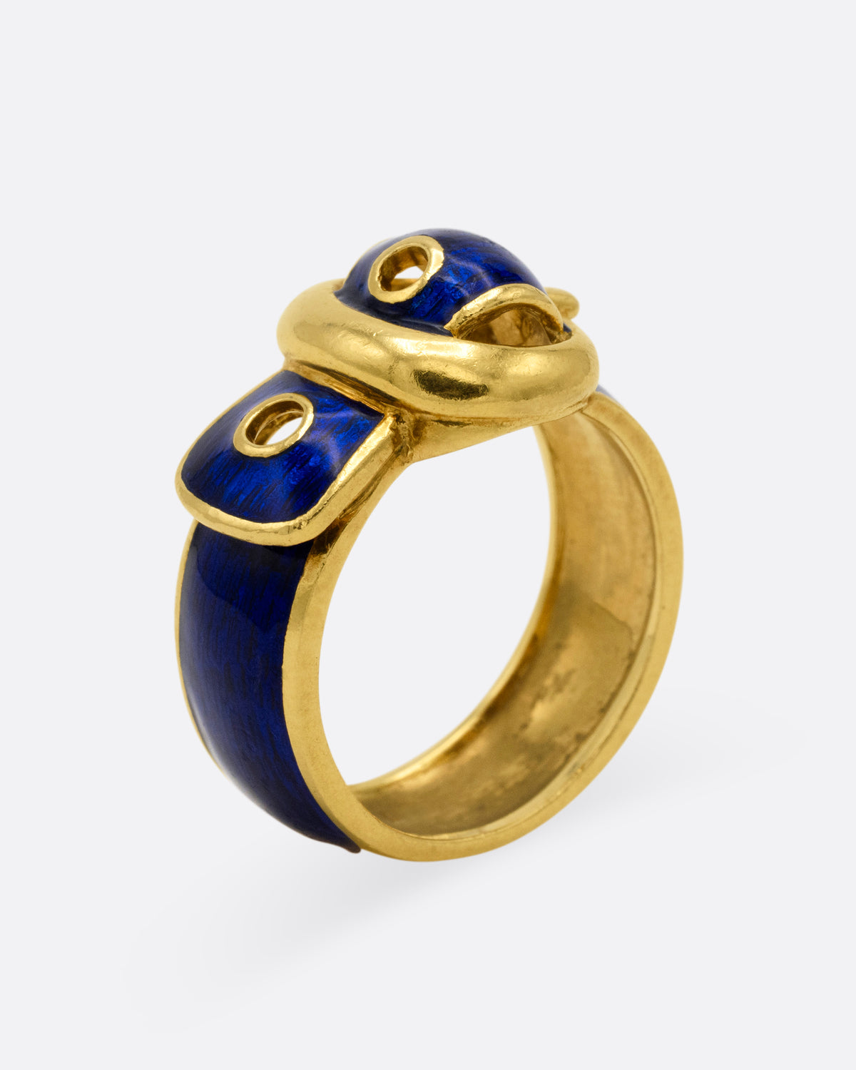 A yellow gold belt buckle ring with blue enamel, shown standing up from the side.