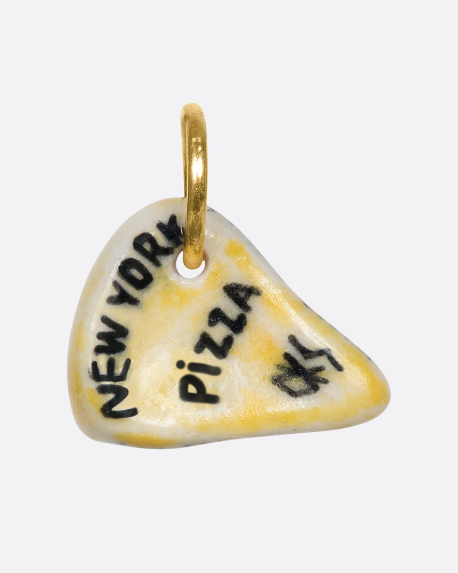 A handmade and painted porcelain pepperoni pizza slice charm with a 14K gold bail.