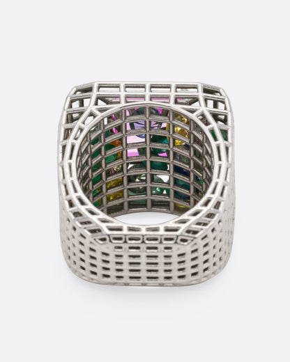 White gold and pink sapphire cage ring, inside view through the band showing the colorful stones caught in the cage