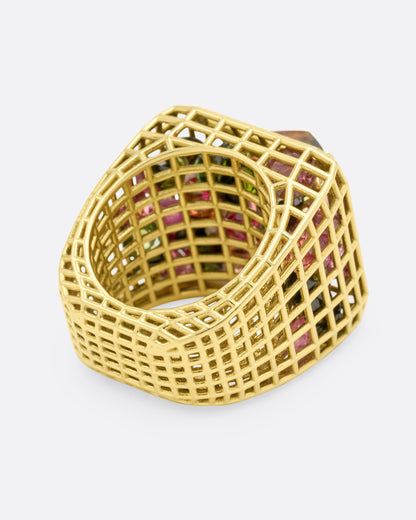 Green gold and bicolor tourmaline cage ring, back view of the green gold openwork band