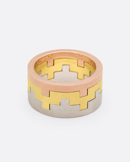 White, yellow and rose gold stacking rings, stacked bands with the rose gold band on top