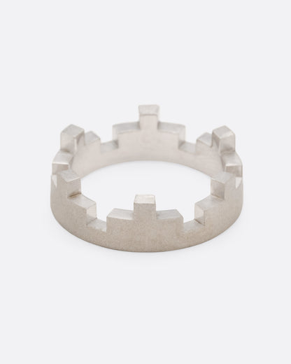 White, yellow and rose gold stacking rings, single white gold band with notched edge