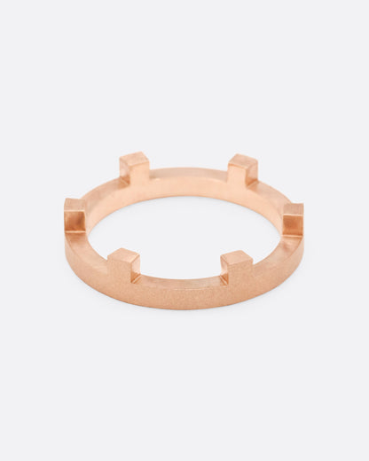 White, yellow and rose gold stacking rings, single rose gold band with notched edge