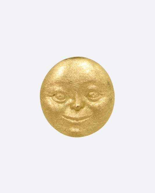 A yellow gold moon face stud earring. Shown from the front.