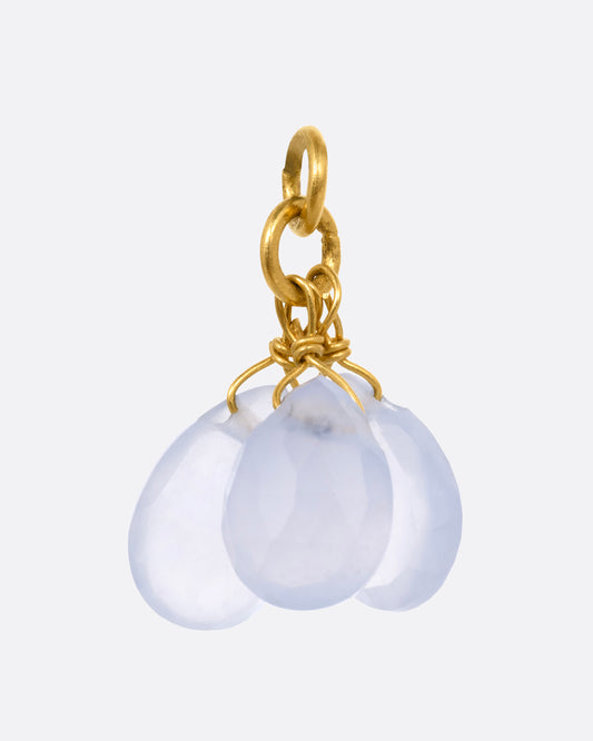  A yellow gold earring dangle with a chalcedony briolette trio, shown from the front.