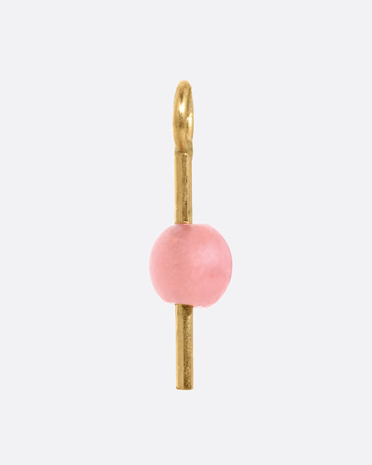A yellow gold earring dangle with a pink rhodochrosite bead, shown from the front.