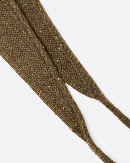 A close up of a donegal flecked olive hooded scarf.
