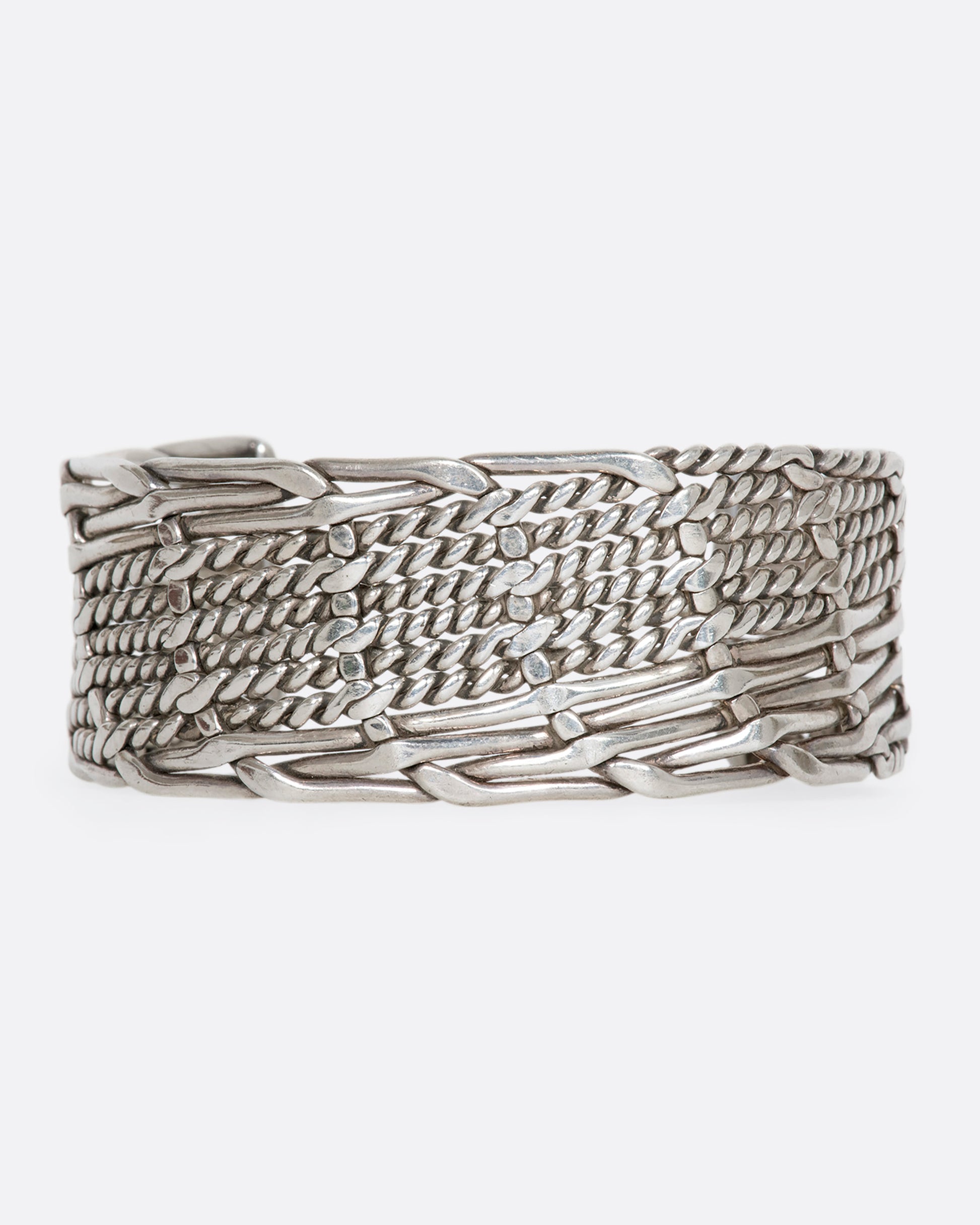 Sterling silver woven and twisted cuff. View from the front.