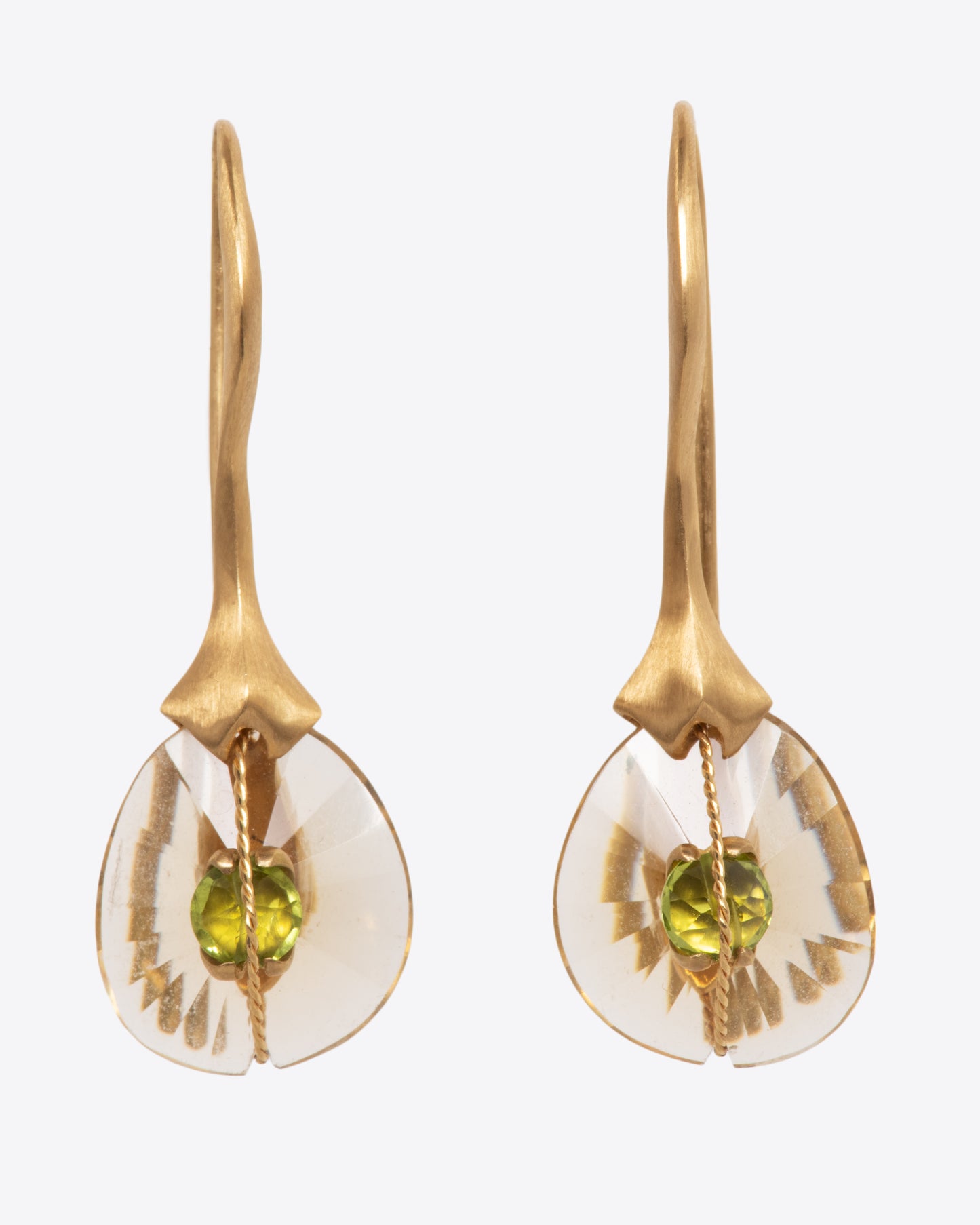 Two yellow gold hook dangle earrings with quartz and peridot. View from the front.