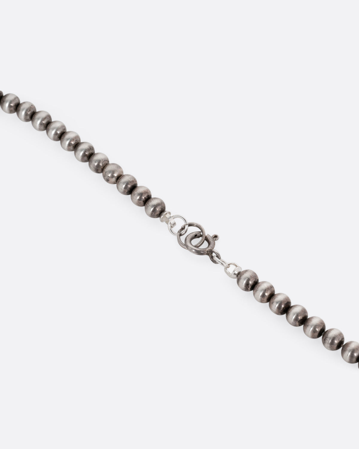 Vintage silver graduated bead necklace, close view of the clasp
