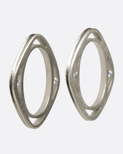 Vintage white gold diamond window stud earrings, side view of the pair showing the depth of the frames