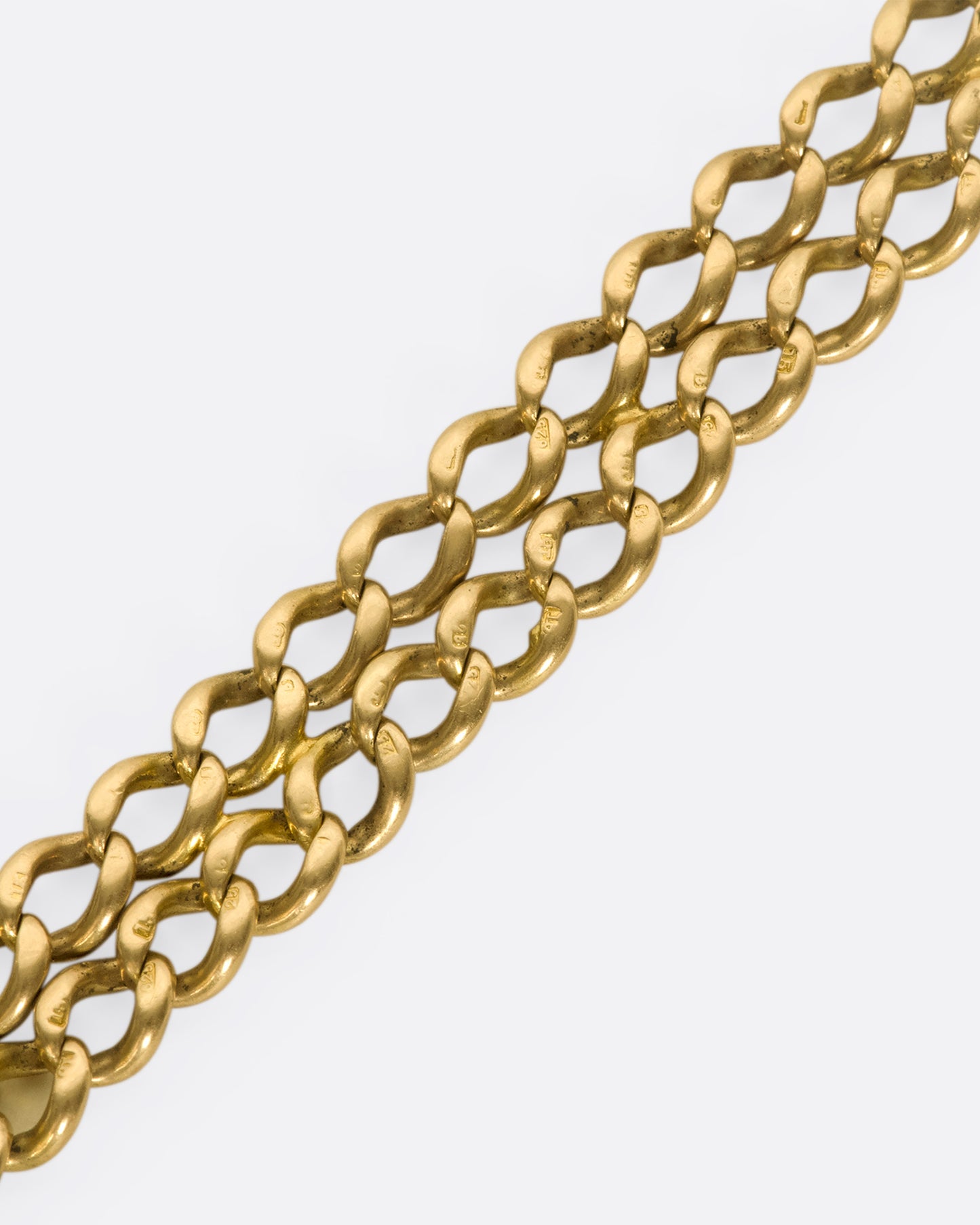 A 15k gold 1950s double-chain bracelet with substantial square clasp, engraved SCB.