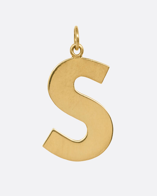 A yellow gold  sans serif letter 's' pendant, shown from the front.