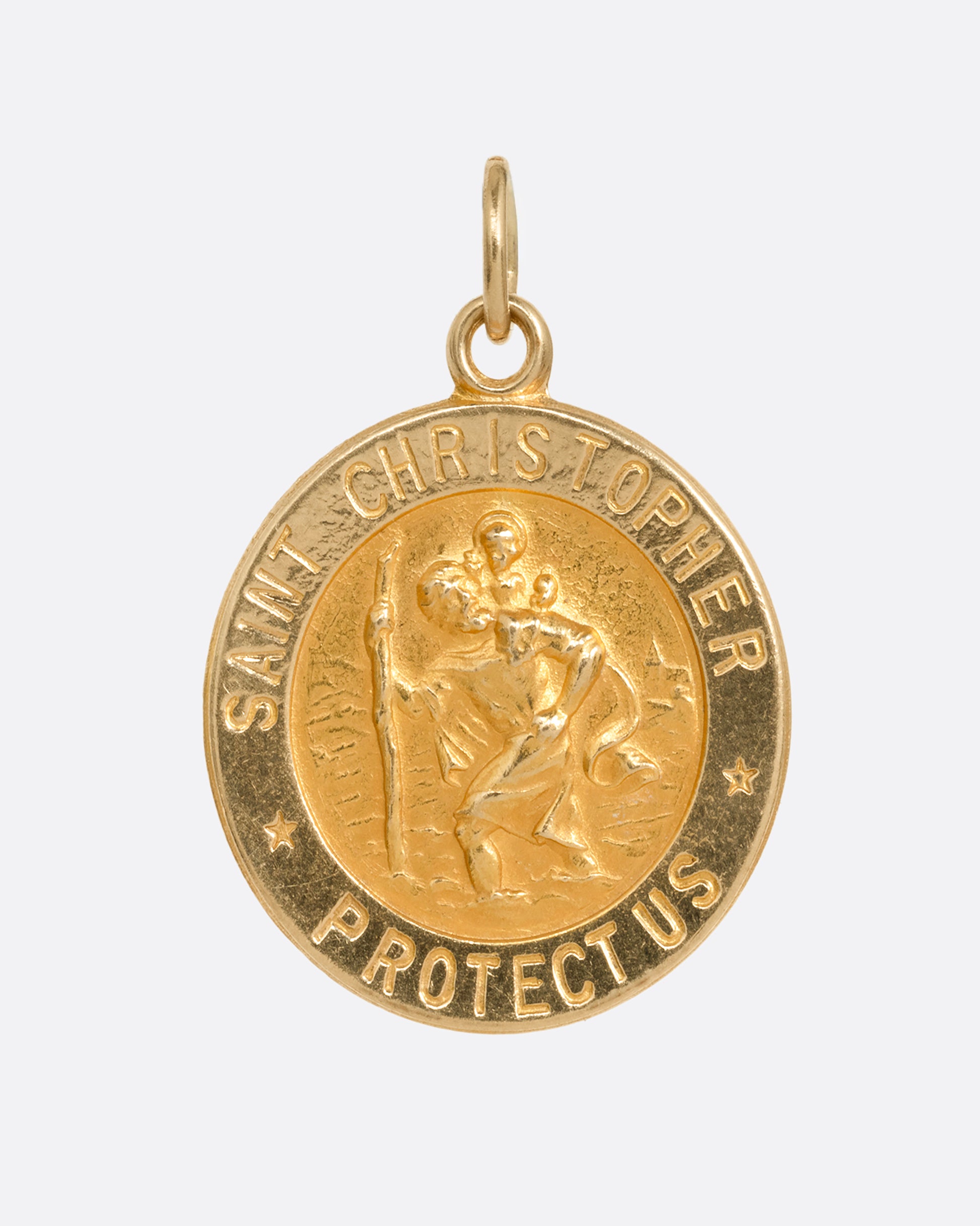 A round yellow gold Saint Christopher pendant, shown from the front.