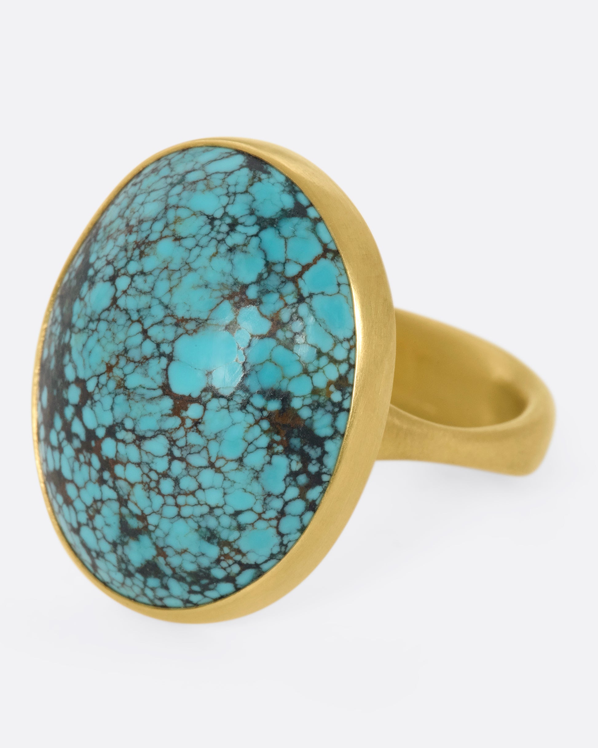 This 14k gold oval Tibetan turquoise ring is incredibly soft and comfortable
