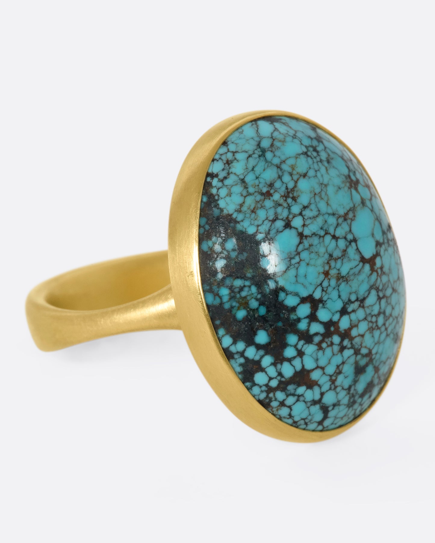 This 14k gold oval Tibetan turquoise ring is incredibly soft and comfortable
