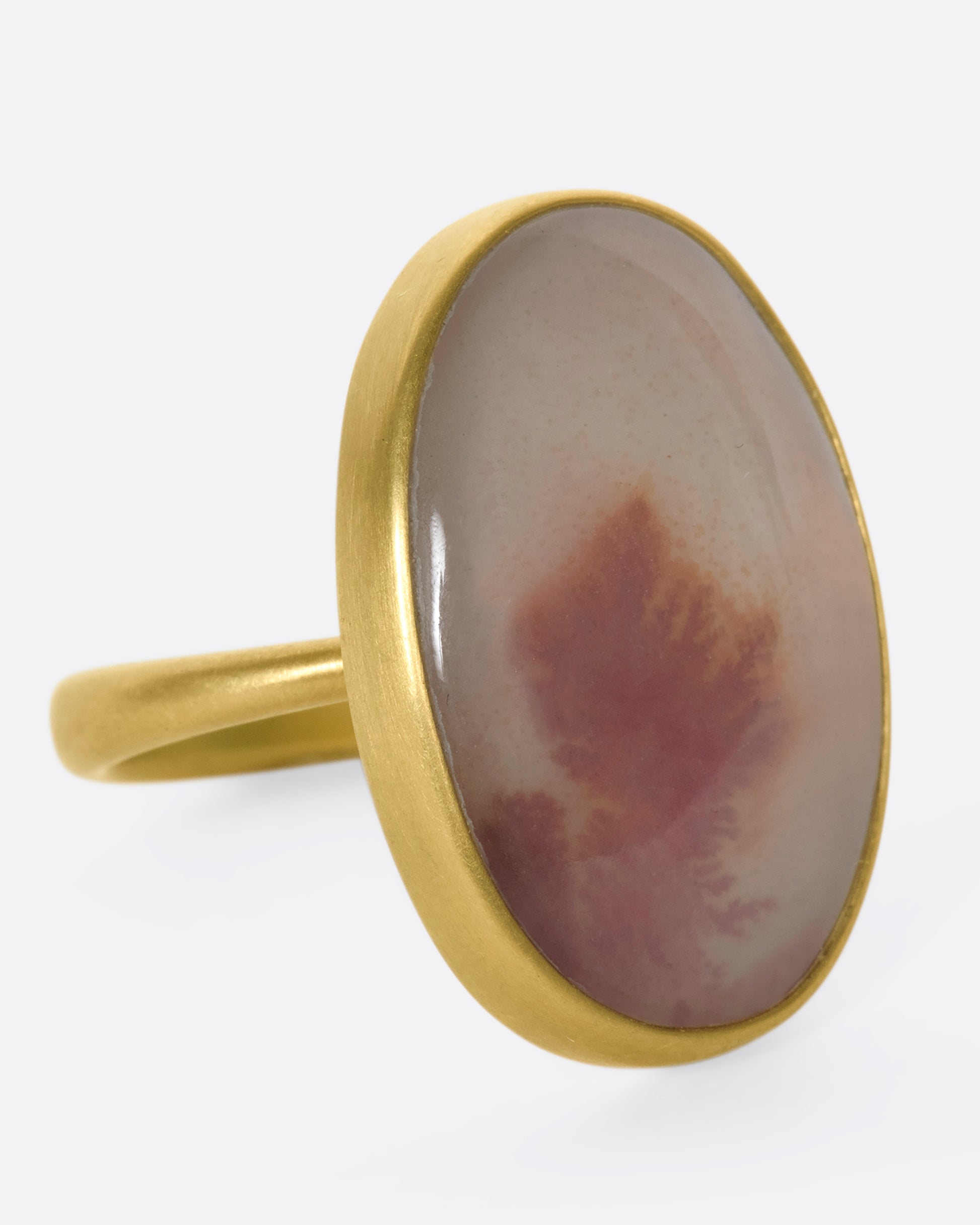 A 14k gold oval dendritic agate quartz ring. The band is perfectly weighted, so the quartz never falls to the side